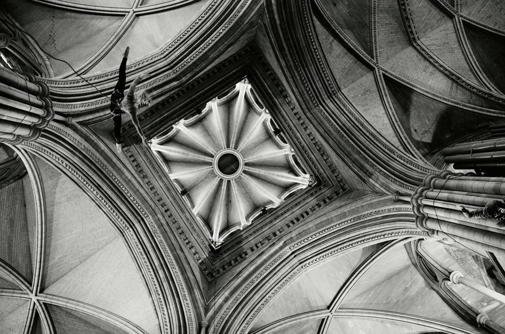 Georgie Barnett from Yskynna Vertical Dance Company rehearsing in Truro Cathedral